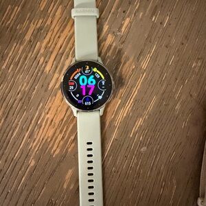 Garmin Smartwatch with sage gray band and face.